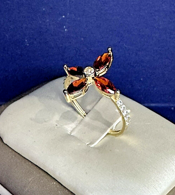 #ad 14kt.real y gold cluster ringwith natural garnetssize8. $145.00