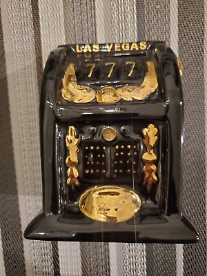 #ad Ceramic Souvenir Slot Machine Coin bank Reno Nevada Black And Gold Coin Bank $20.00
