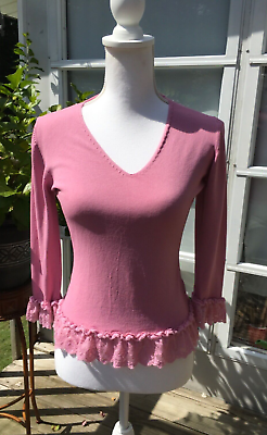 #ad Italian pink sweater by Excellent with lace on the arm cuffs and bottom $22.00
