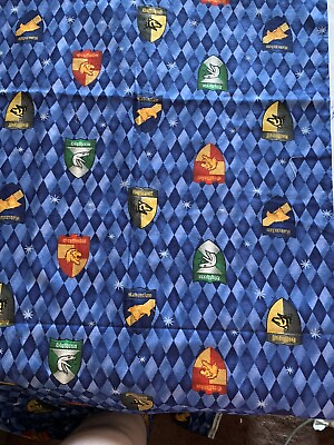 HARRY POTTER HOUSE SHIELDS On BLUE GROUND SPRINGS FABRIC 45”W BTY $19.99