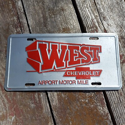 #ad CAR DEALERSHIP LICENSE PLATE: West Chevrolet Airport Motor Mile metal $14.50