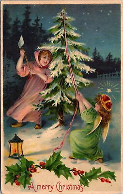 Christmas Postcard Two Angel Girls Chopping Down a Tree with an Axe in the Snow $10.00